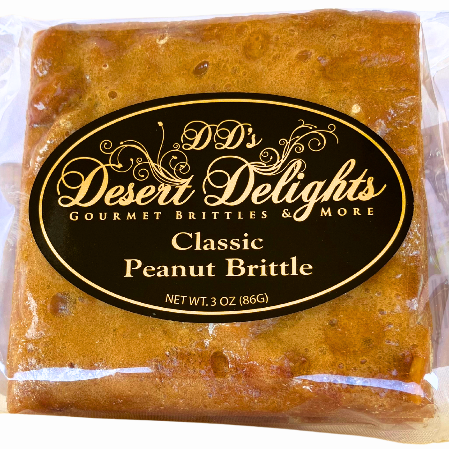 Packaged classic peanut brittle with 'D.D's Desert Delights' label on a white background