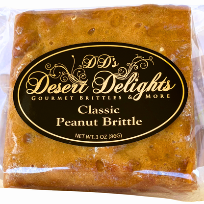 Packaged classic peanut brittle with 'D.D's Desert Delights' label on a white background