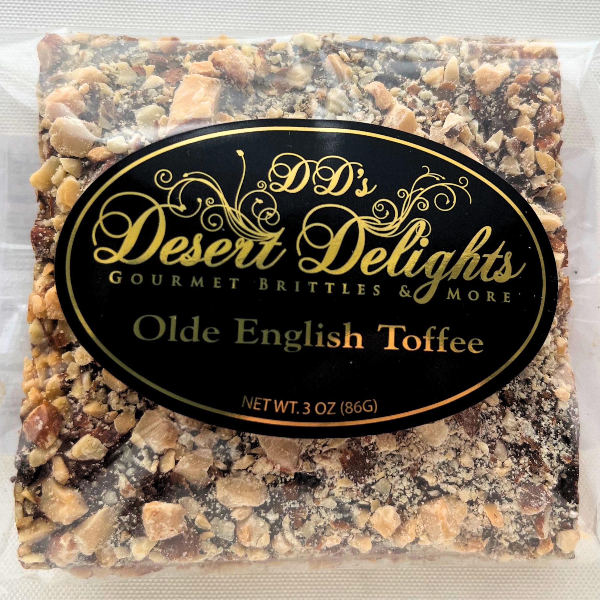 Packaged Olde English Toffee with 'DD's Desert Delights' label on a white background